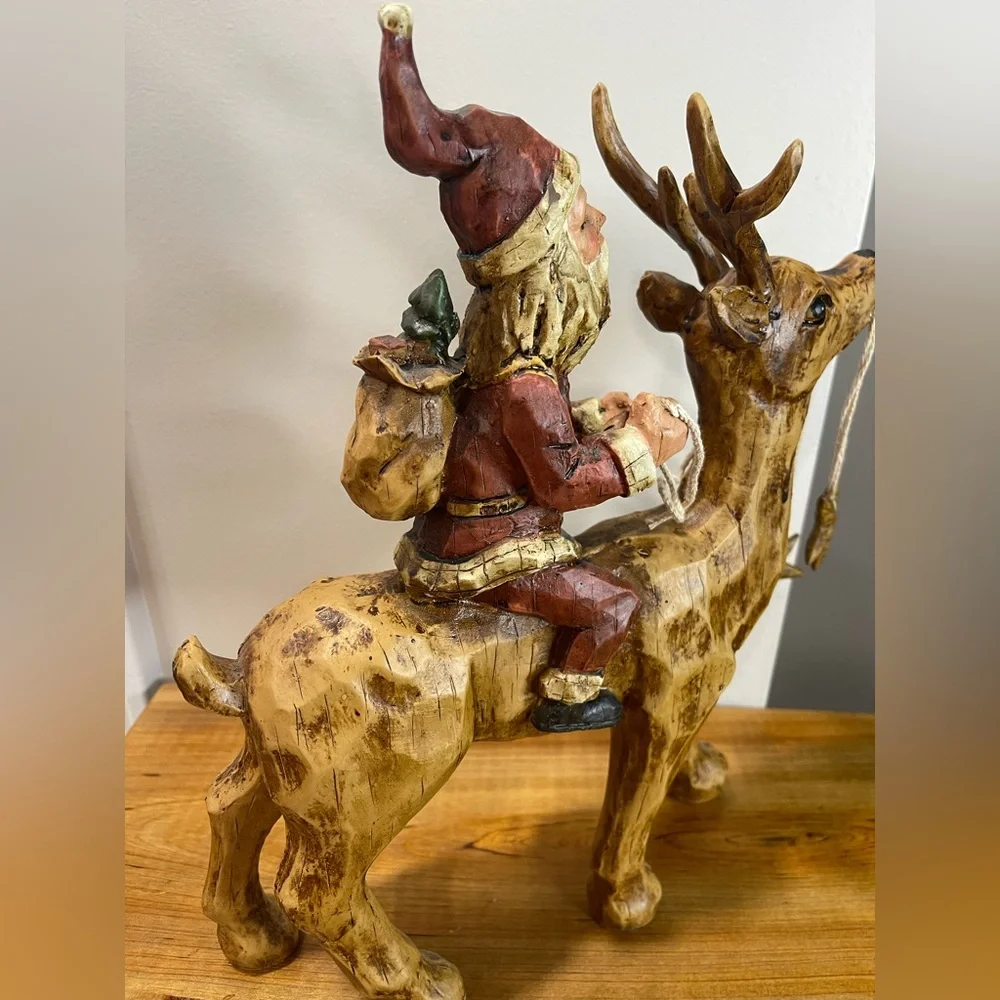 Primitive Folk Art Santa riding Reindeer 12”‎ tall chiseled resin faux wood